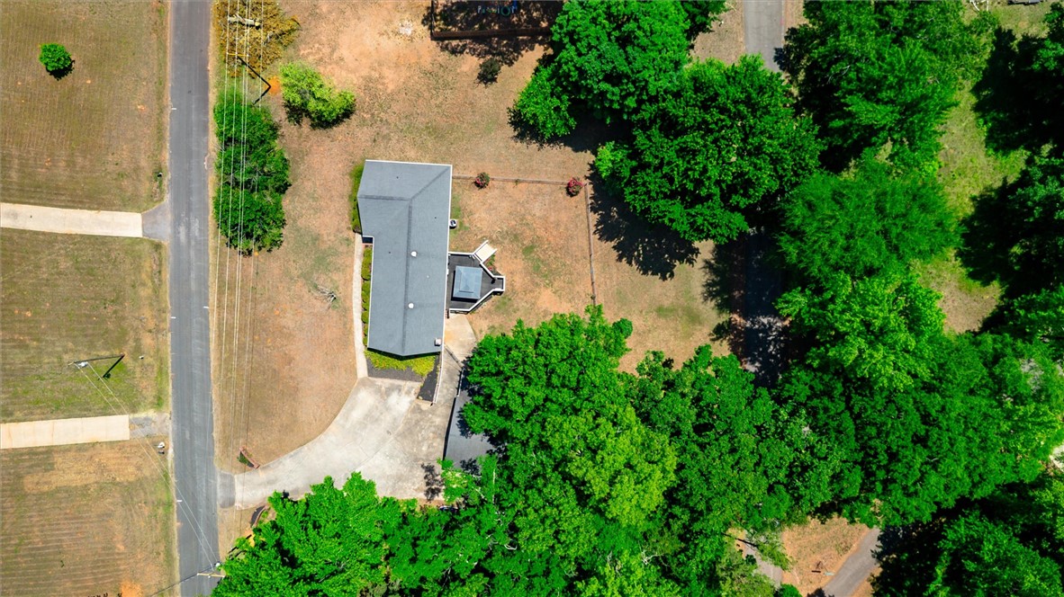 1815 Pearman Dairy Road Anderson, SC 29625 - Photo 29 of 35 An aerial perspective showcases the private yard and verdant surrounding trees.