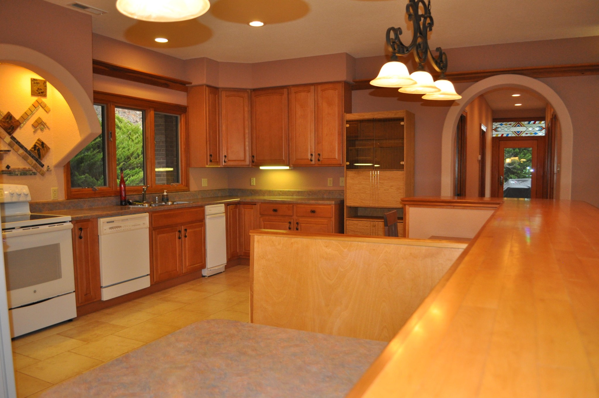 400 Burkhart Road Rutledge, TN 37861 - Photo 14 of 33 a large kitchen with cabinets a sink and a stove