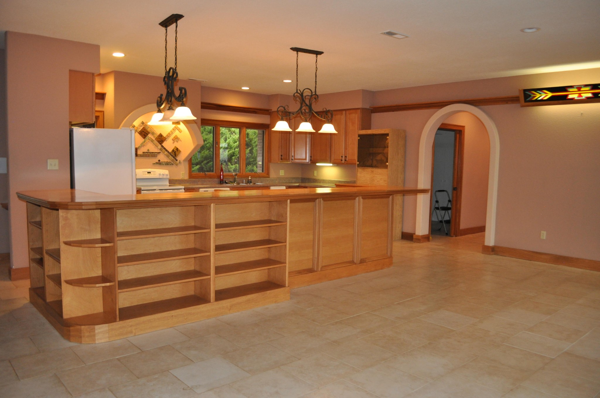 400 Burkhart Road Rutledge, TN 37861 - Photo 15 of 33 a room with kitchen island stainless steel appliances wooden floor and chandelier