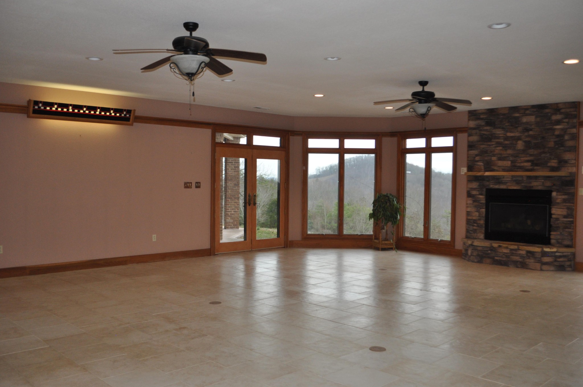 400 Burkhart Road Rutledge, TN 37861 - Photo 17 of 33 a view of an empty room with a fireplace and a window