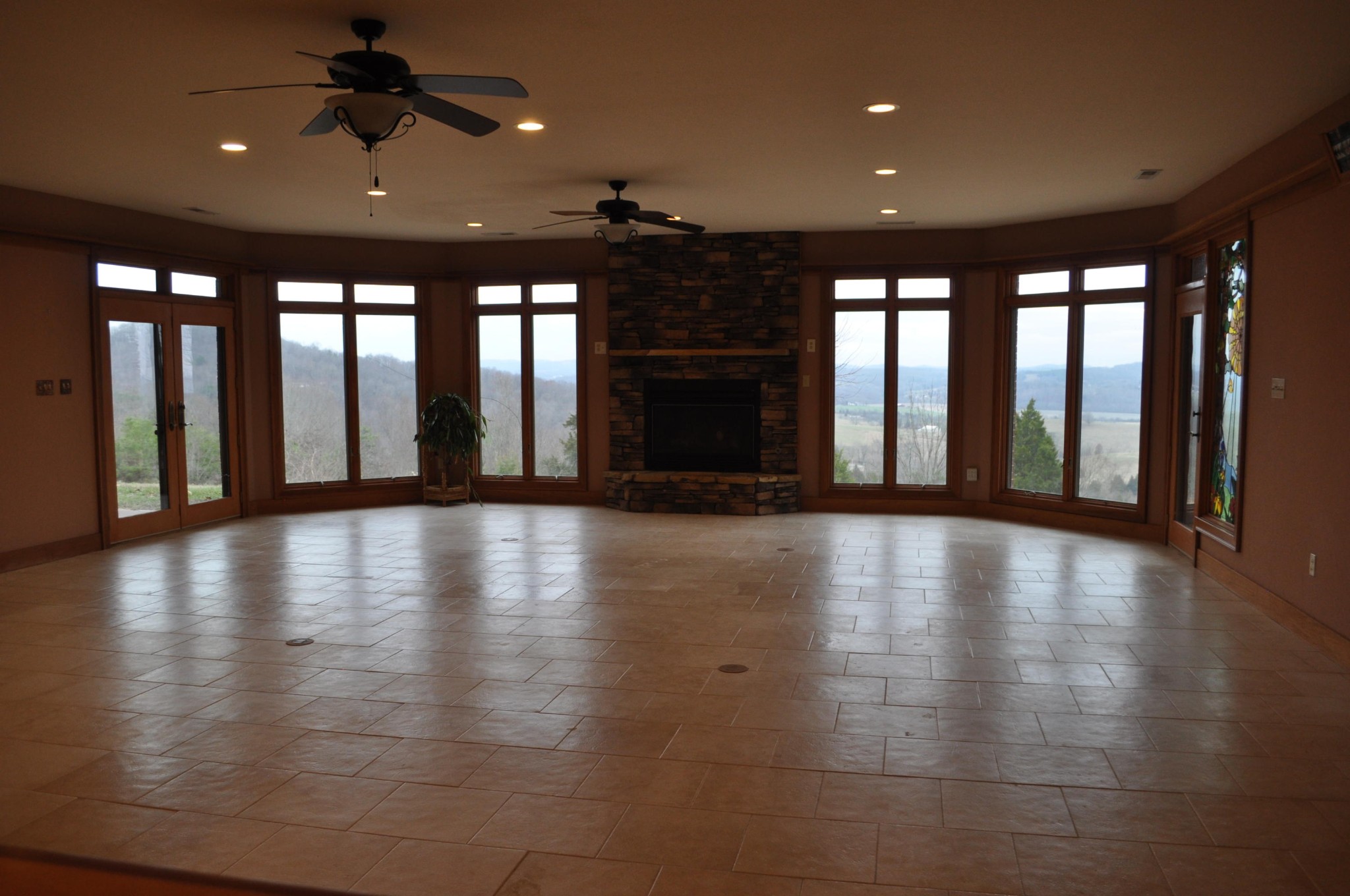 400 Burkhart Road Rutledge, TN 37861 - Photo 18 of 33 an empty room with floor to ceiling window and wooden floor