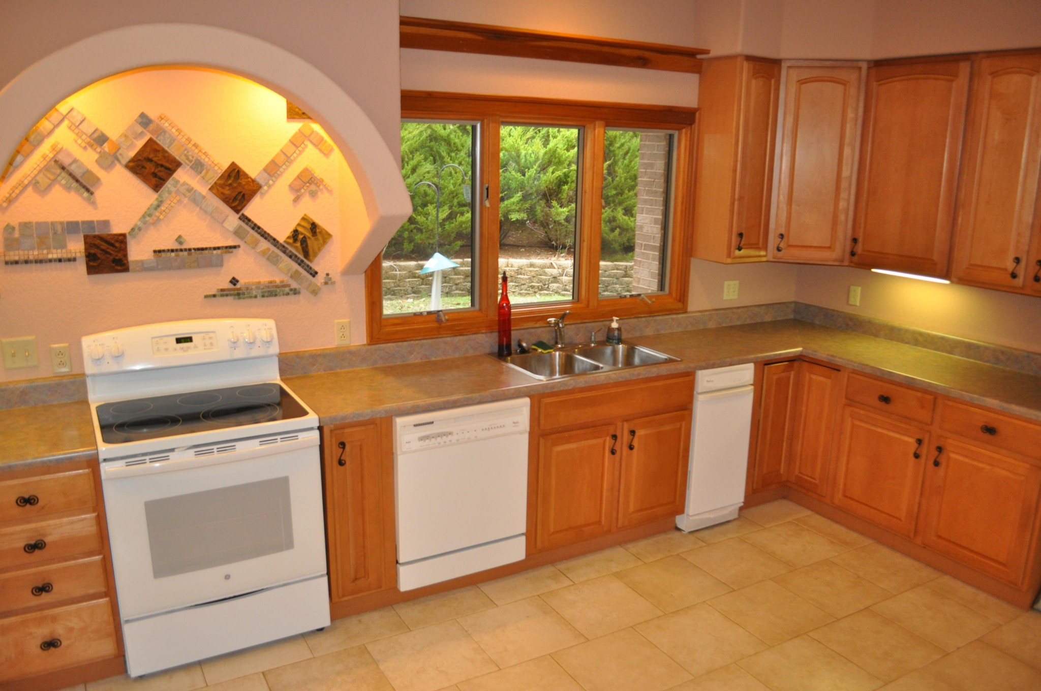 400 Burkhart Road Rutledge, TN 37861 - Photo 9 of 33 a kitchen with a stove a sink and a microwave