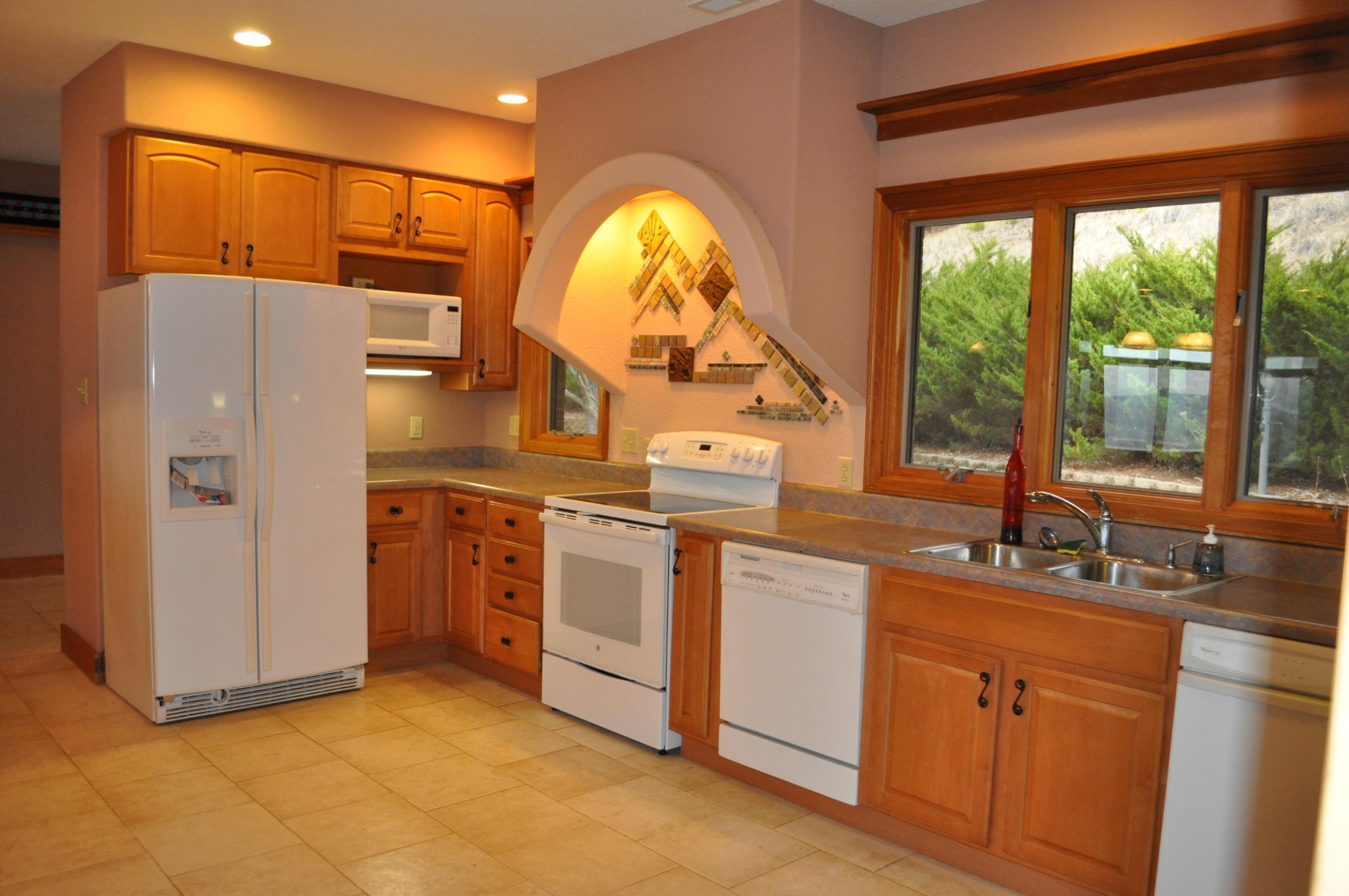 400 Burkhart Road Rutledge, TN 37861 - Photo 10 of 33 a kitchen with stainless steel appliances granite countertop a sink a stove and a refrigerator