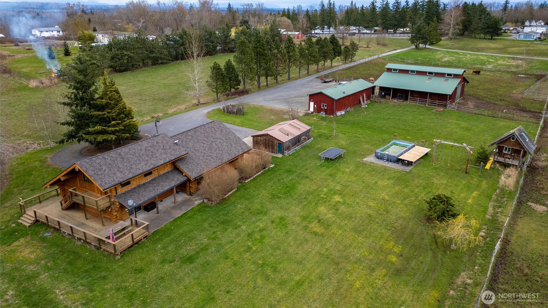 3883 Everett Road Ferndale, WA 98248 - Photo 3 of 40 an aerial view of a house with outdoor space pool water fountain and outdoor seating