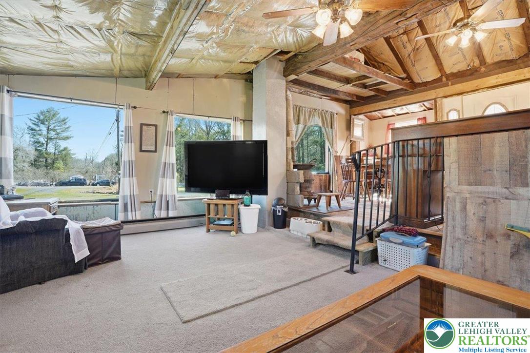 4532 Long Run Road Lehighton, PA 18235 - Photo 14 of 84 a living room with furniture and a flat screen tv