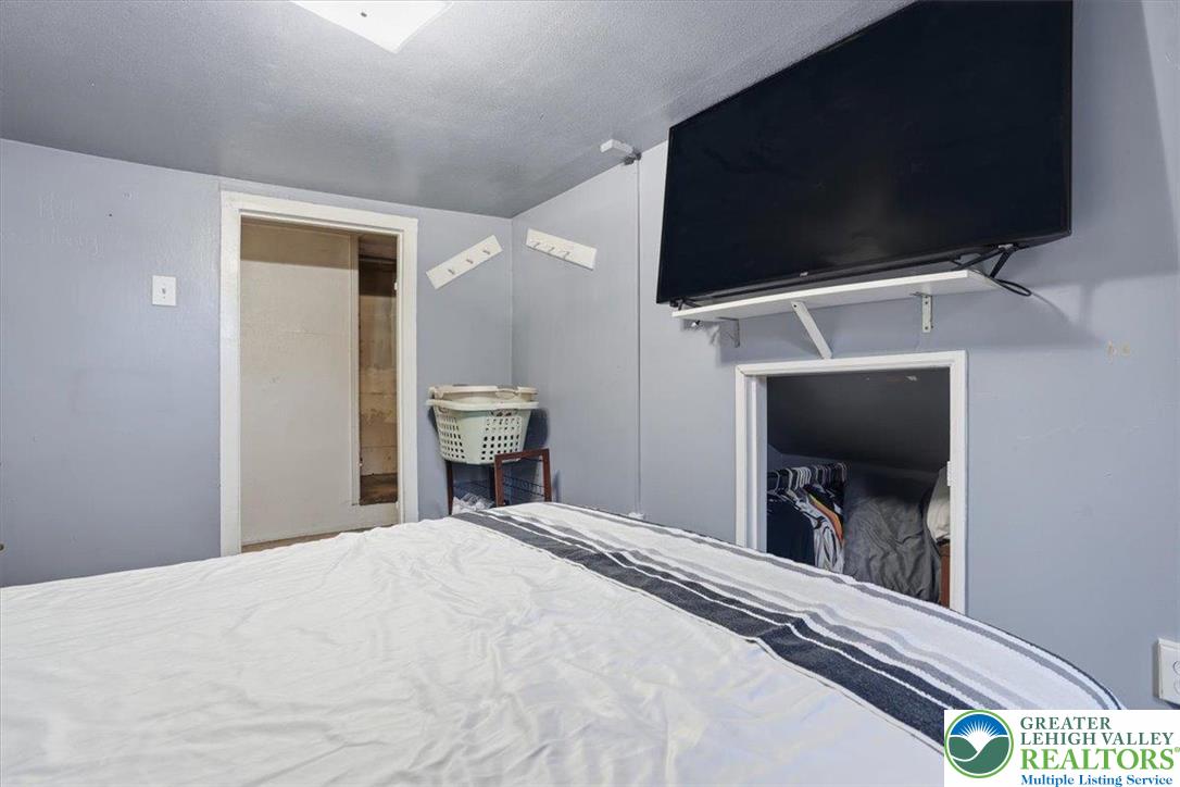 4532 Long Run Road Lehighton, PA 18235 - Photo 34 of 84 a bedroom with a bed and a television