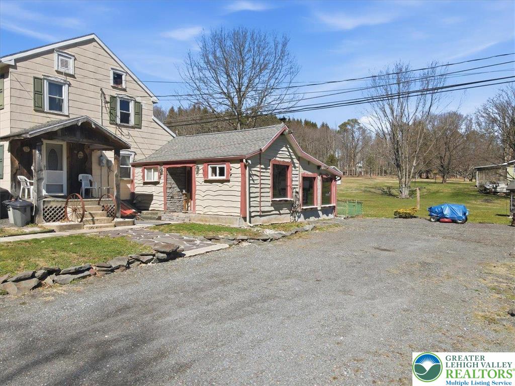 4532 Long Run Road Lehighton, PA 18235 - Photo 56 of 84 a view of a house with a yard and garage