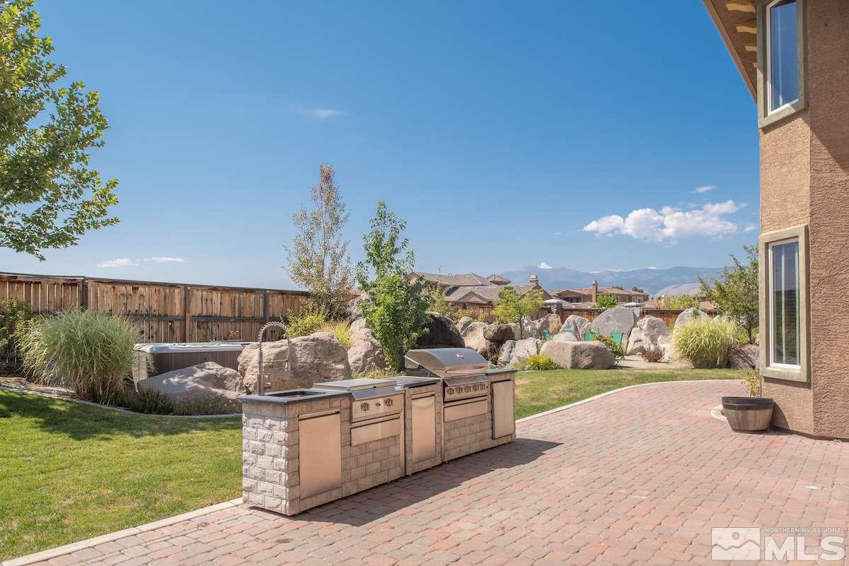 9898 Kerrydale Court Reno, NV 89521 - Photo 23 of 25 a view of a terrace with a garden
