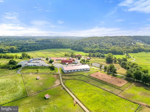 a view of a pool with a patio