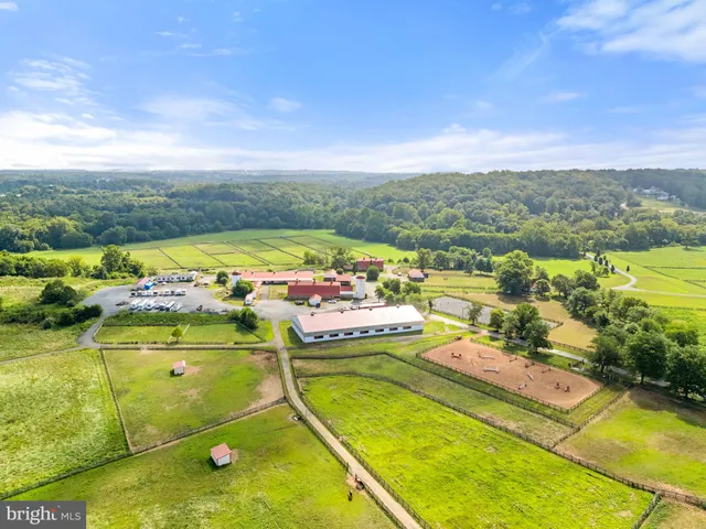 a view of a pool with a patio