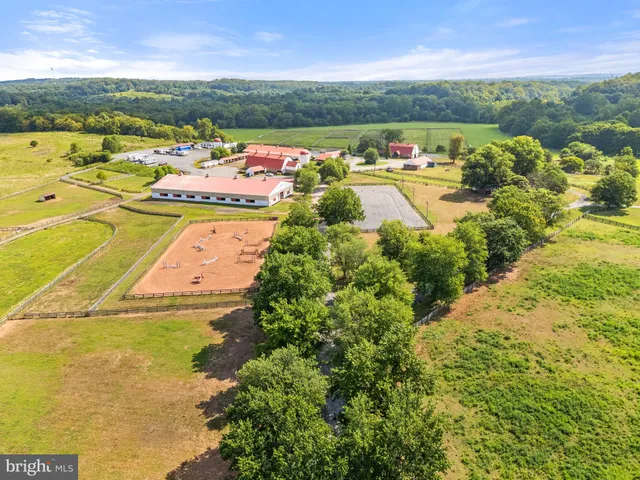 a view of an swimming pool and an outdoor seating