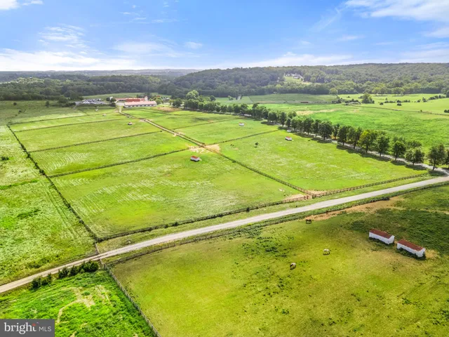 a view of a lake with a yard