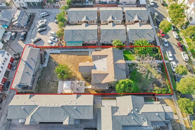 an aerial view of a city with lots of residential buildings