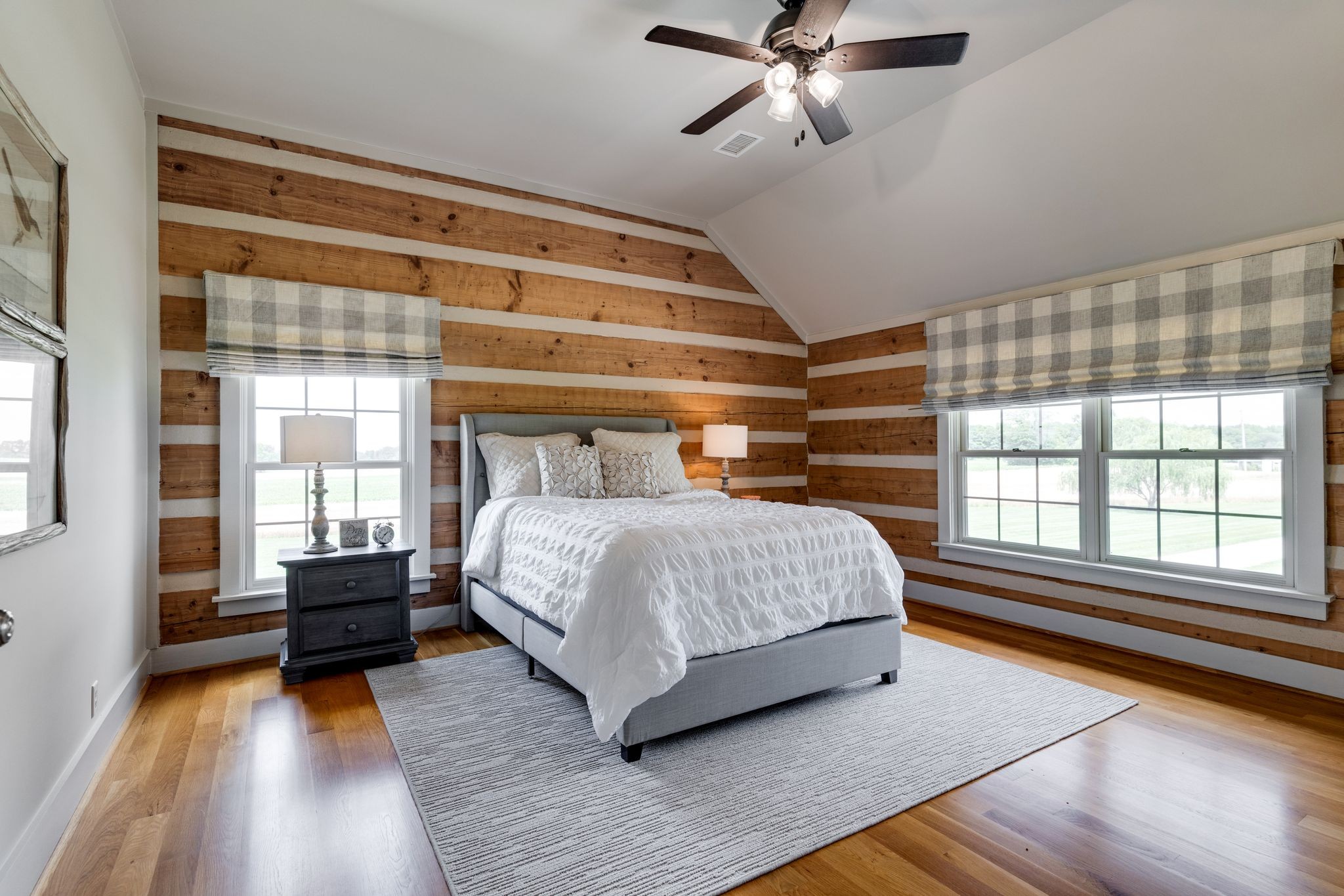 5110 Fred Perry Road Springfield, TN 37172 - Photo 23 of 36 a bedroom with a bed and wooden floor