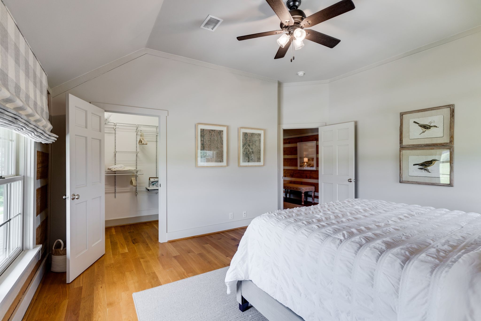 5110 Fred Perry Road Springfield, TN 37172 - Photo 24 of 36 a bedroom with a bed and a chandelier