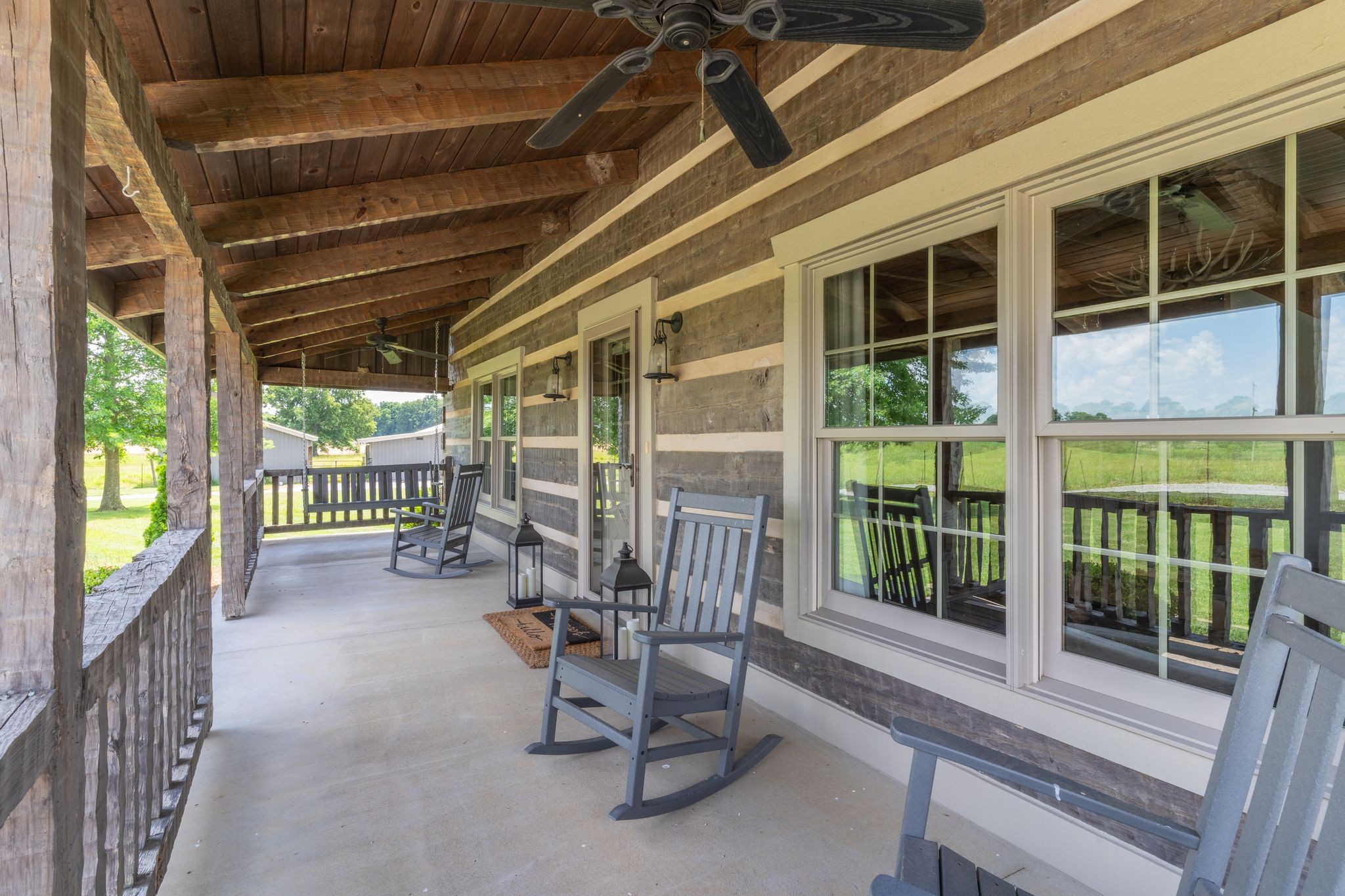5110 Fred Perry Road Springfield, TN 37172 - Photo 7 of 36 a view of a porch with chairs and backyard