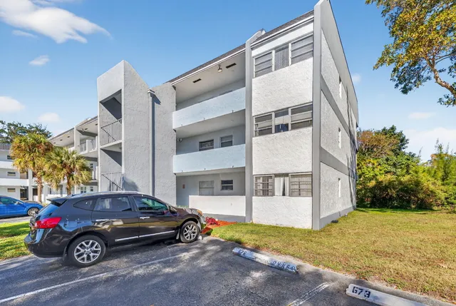 a car parked in front of a house