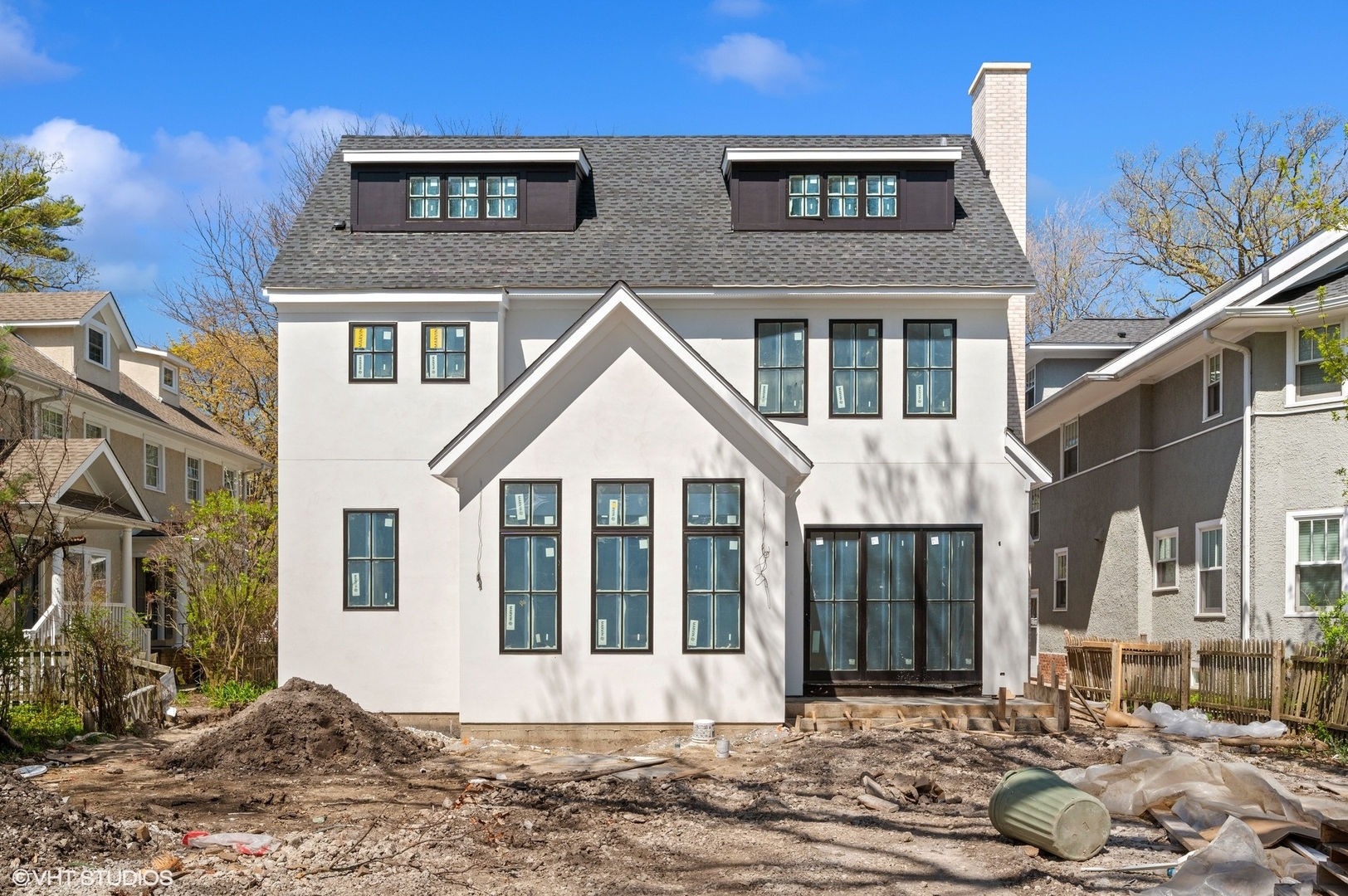 419 Laurel Avenue Wilmette, IL 60091 - Photo 4 of 6 a front view of a house with a yard