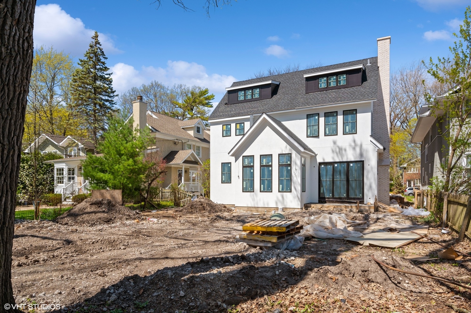 419 Laurel Avenue Wilmette, IL 60091 - Photo 5 of 6 a front view of a house with a yard