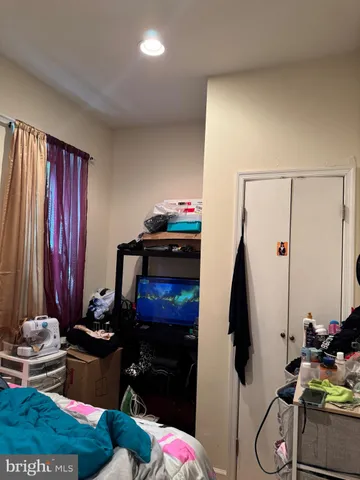 a view of a kitchen with appliances and cabinets