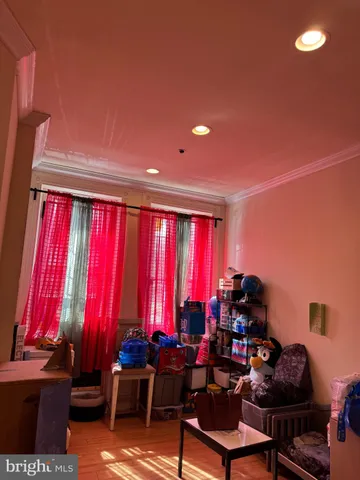 a room with furniture and musical instruments