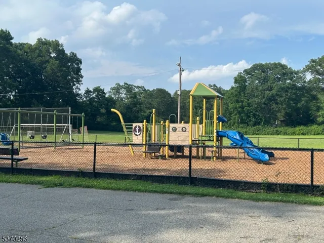 a view of a park with slide