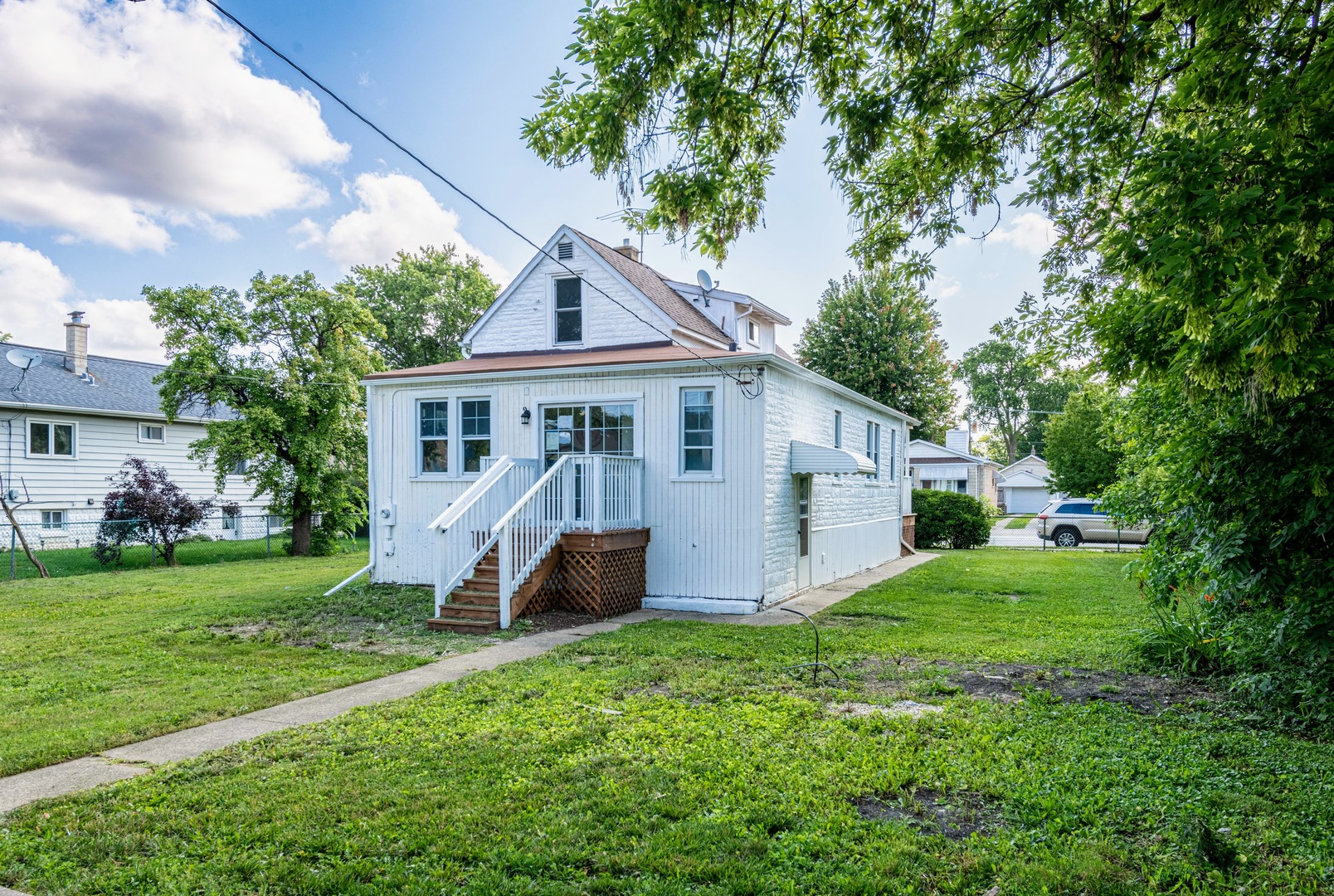 3340 Maple Avenue Brookfield, IL 60513 - Photo 1 of 26 a view of a house with backyard and a tree