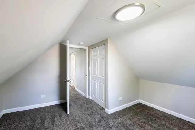 a view of a room that has a window in it