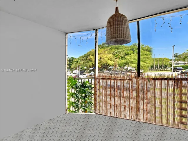 a view of a room and window