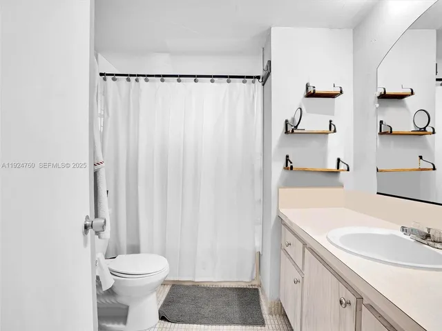 a view of work space with furniture and wooden floor