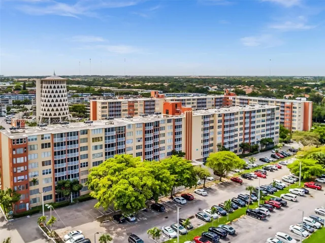 an aerial view of residential building and lake view