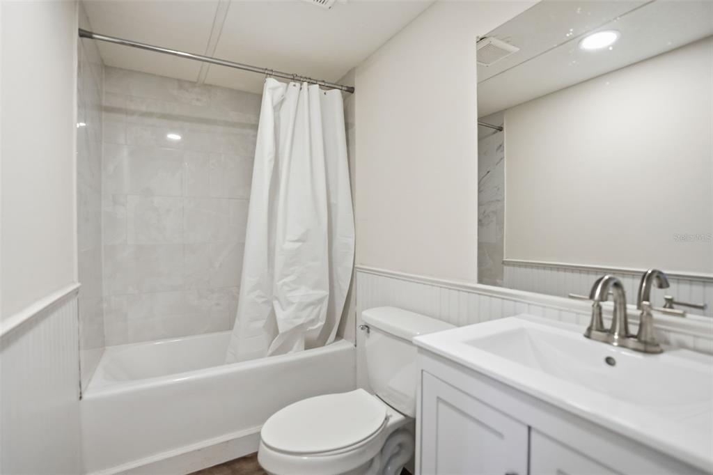 25256 Richbarn Road Brooksville, FL 34601 - Photo 20 of 32 a bathroom with a sink toilet and shower