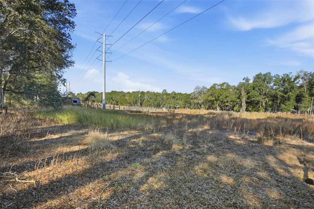 25256 Richbarn Road Brooksville, FL 34601 - Photo 26 of 32 a view of lake with green space