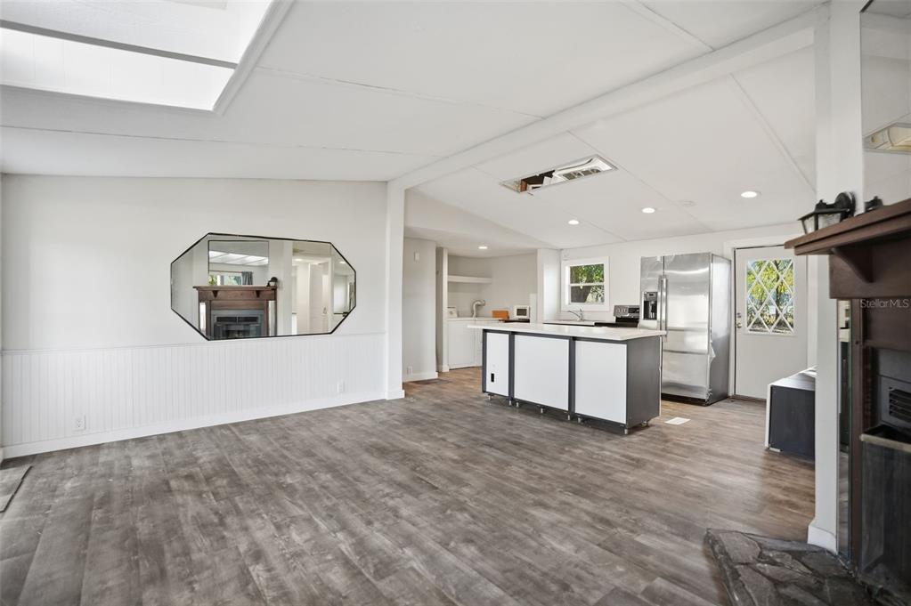 25256 Richbarn Road Brooksville, FL 34601 - Photo 7 of 32 a view of a kitchen with a sink and a refrigerator
