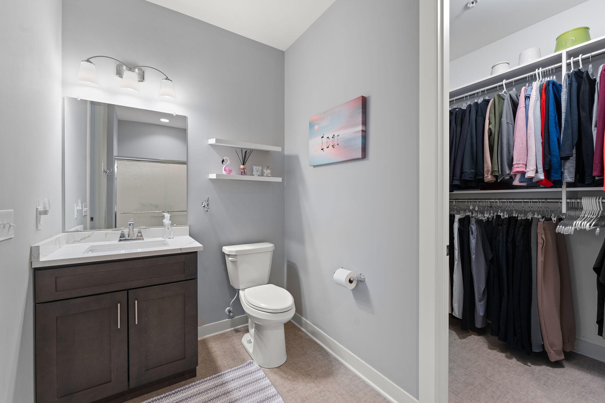 1346 Parke Drive Crown Point, IN 46307 - Photo 15 of 20 a bathroom with a toilet sink and mirror