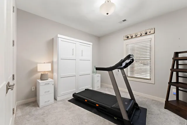 a view of a room with gym equipment