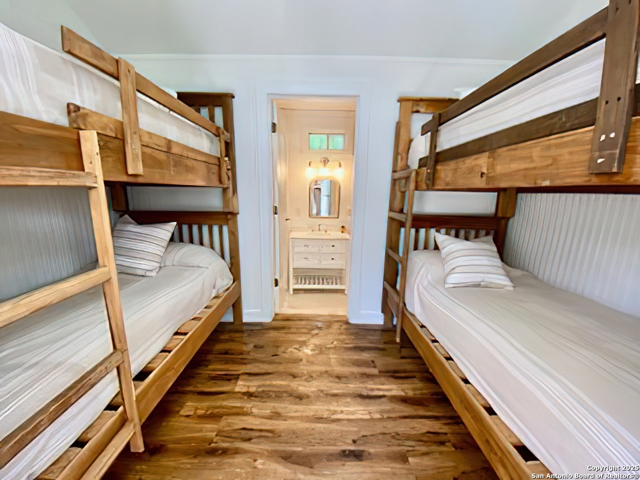 512 County Road 348 Concan, TX 78838 - Photo 35 of 39 a bedroom with bed and balcony