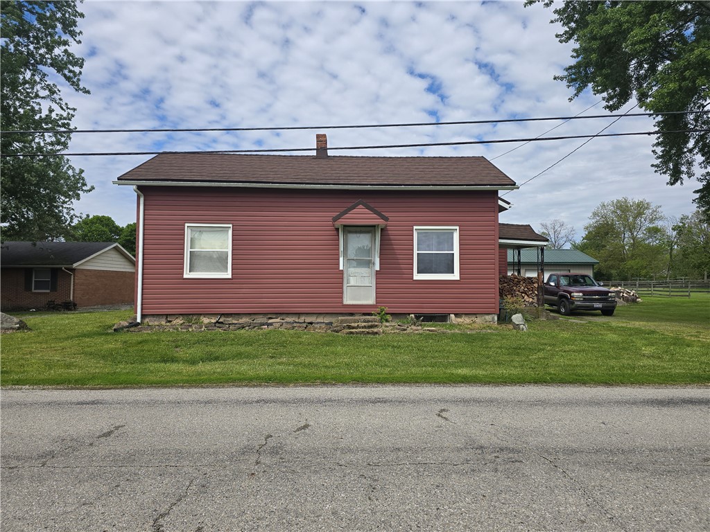 457 Wolf Road West Alexandria, OH 45381 - Photo 2 of 28 This charming residence features a well-maintained exterior with classic siding and a welcoming entrance.