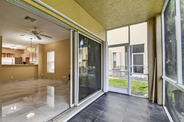 a view of a room with a large window