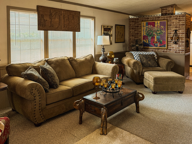 38569 North Sheridan Road, Unit 390 Beach Park, IL 60099 - Photo 17 of 28 a living room with furniture and a large window