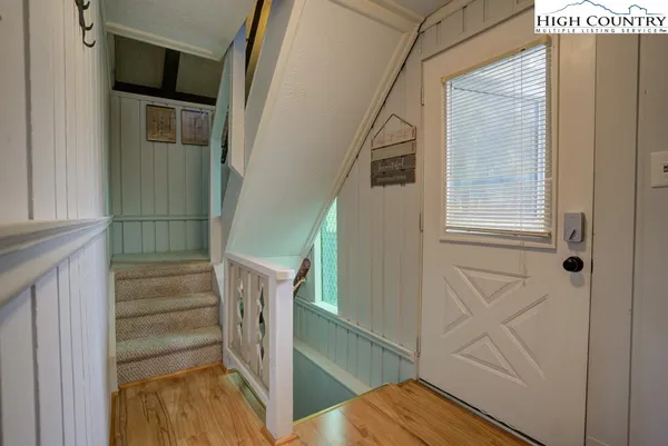 a view of front door of stairs