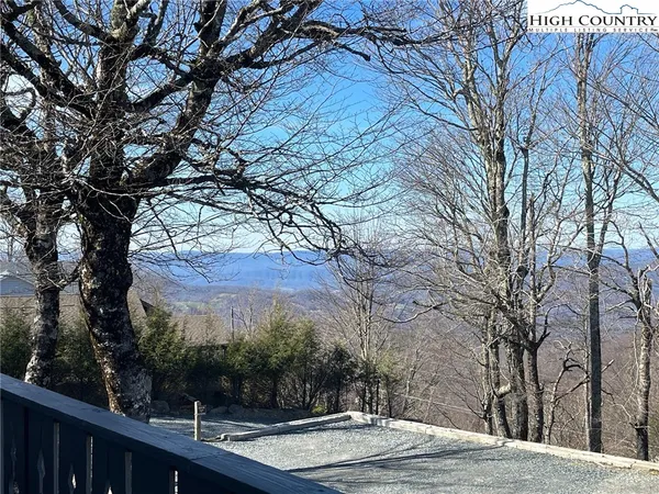 a view of a backyard of the house