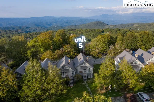 an aerial view of residential house with outdoor space