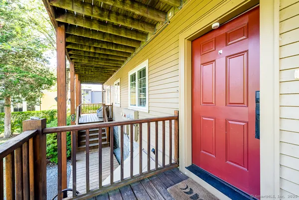 a view of a porch with furniture