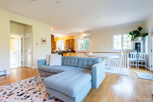 a living room with furniture and a table