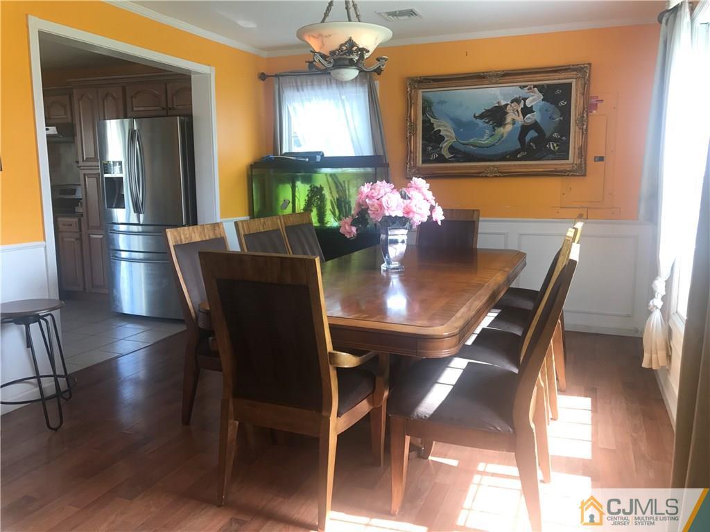 55 Knollwood Road Edison, NJ 08817 - Photo 12 of 25 a dining room with furniture and window