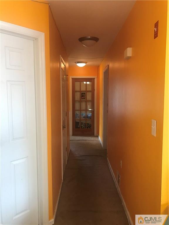 55 Knollwood Road Edison, NJ 08817 - Photo 17 of 25 a view of hallway with windows