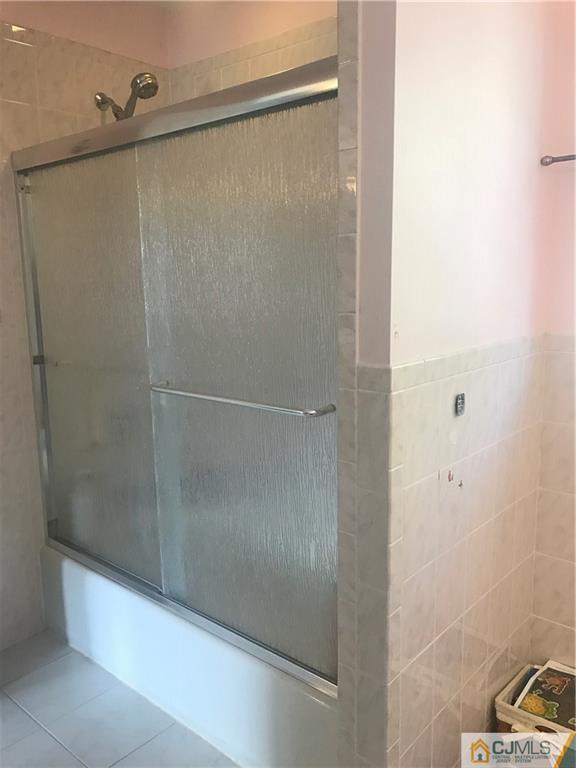 55 Knollwood Road Edison, NJ 08817 - Photo 18 of 25 a bathroom with a shower