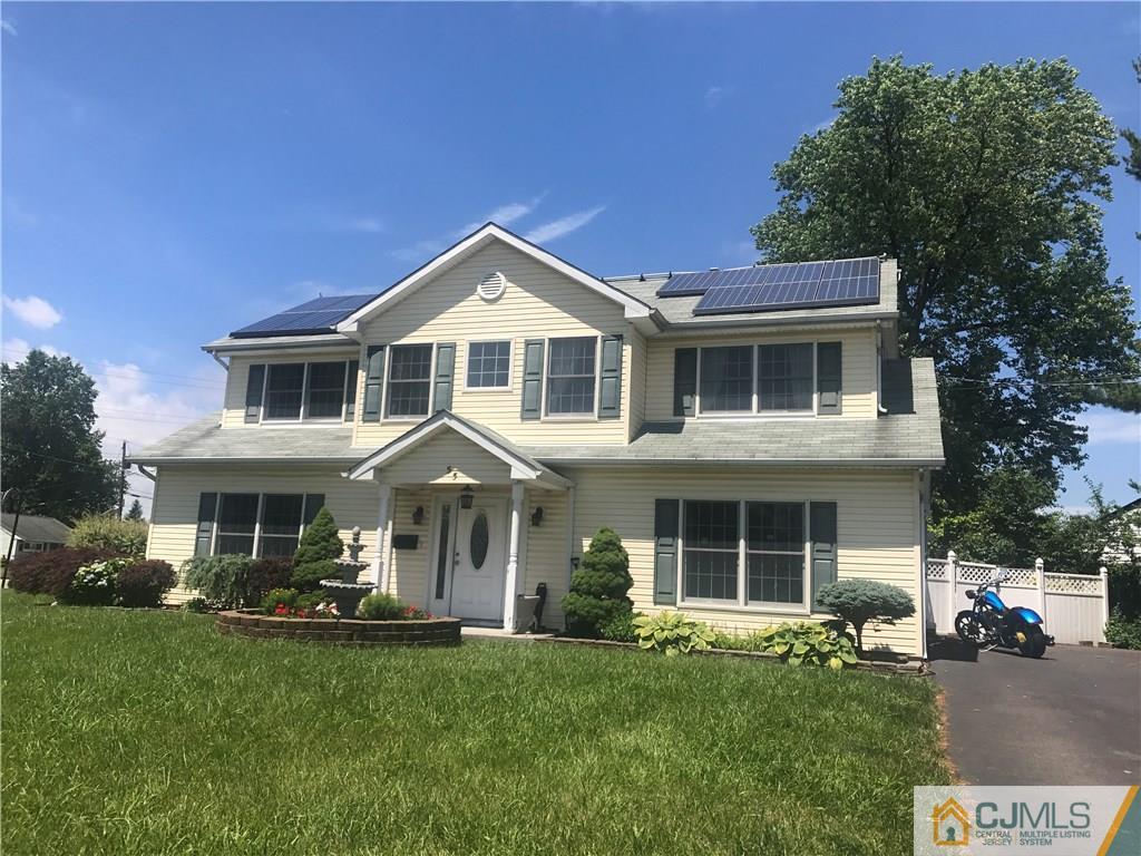 55 Knollwood Road Edison, NJ 08817 - Photo 3 of 25 a front view of a house with a yard