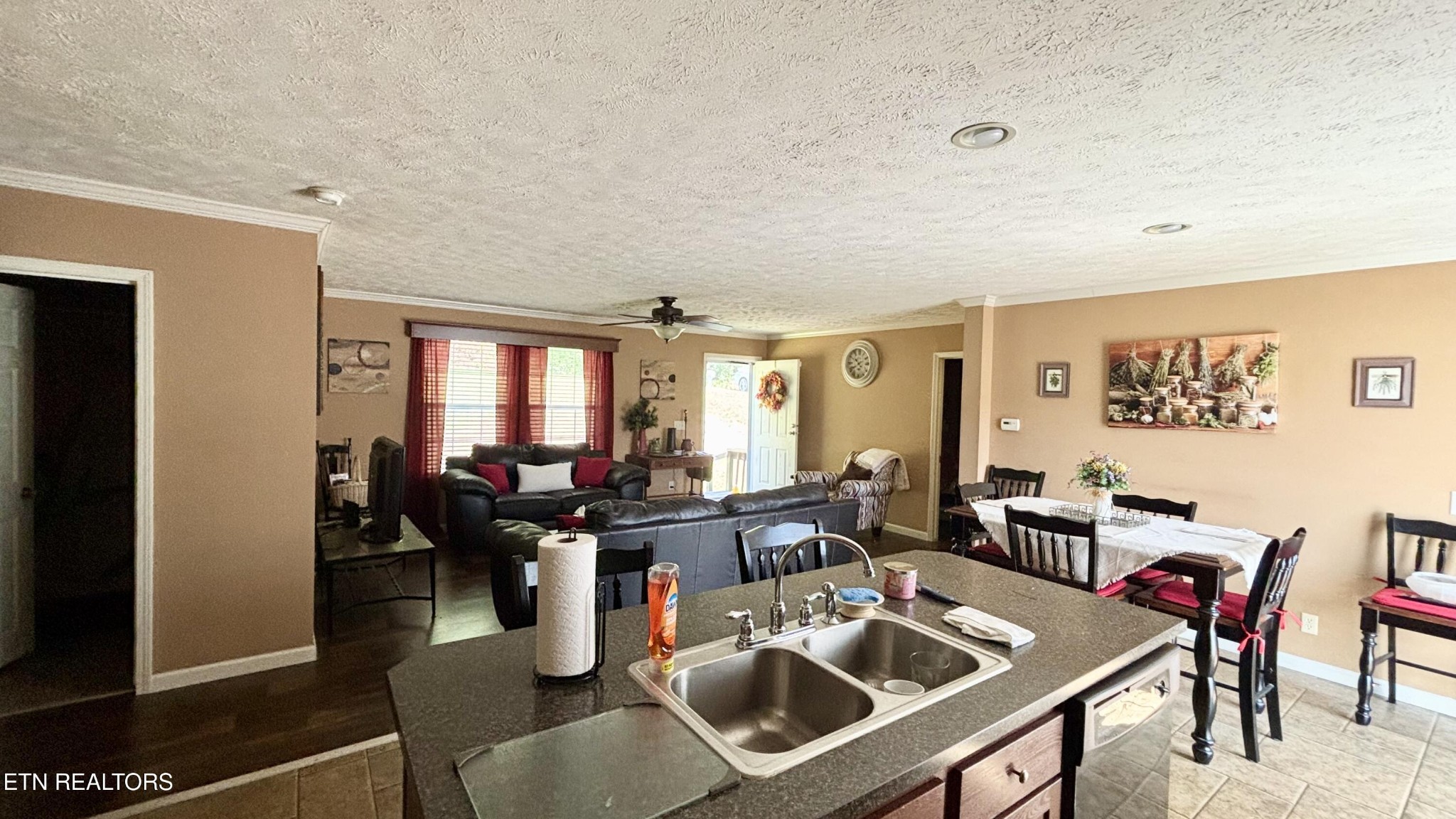 9400 Pedigo Road Powell, TN 37849 - Photo 7 of 18 a kitchen with a table and chairs in it